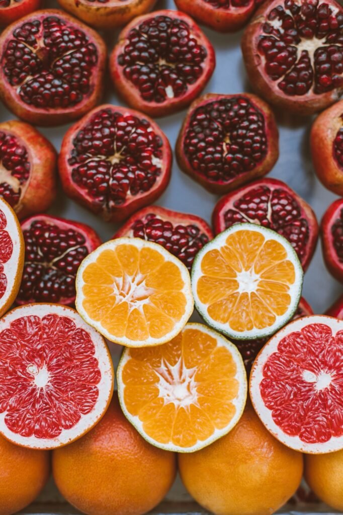 Sliced oranges, grapefruit, and pomegranate, safe dairy-free and soy-free produce for MSPI diets